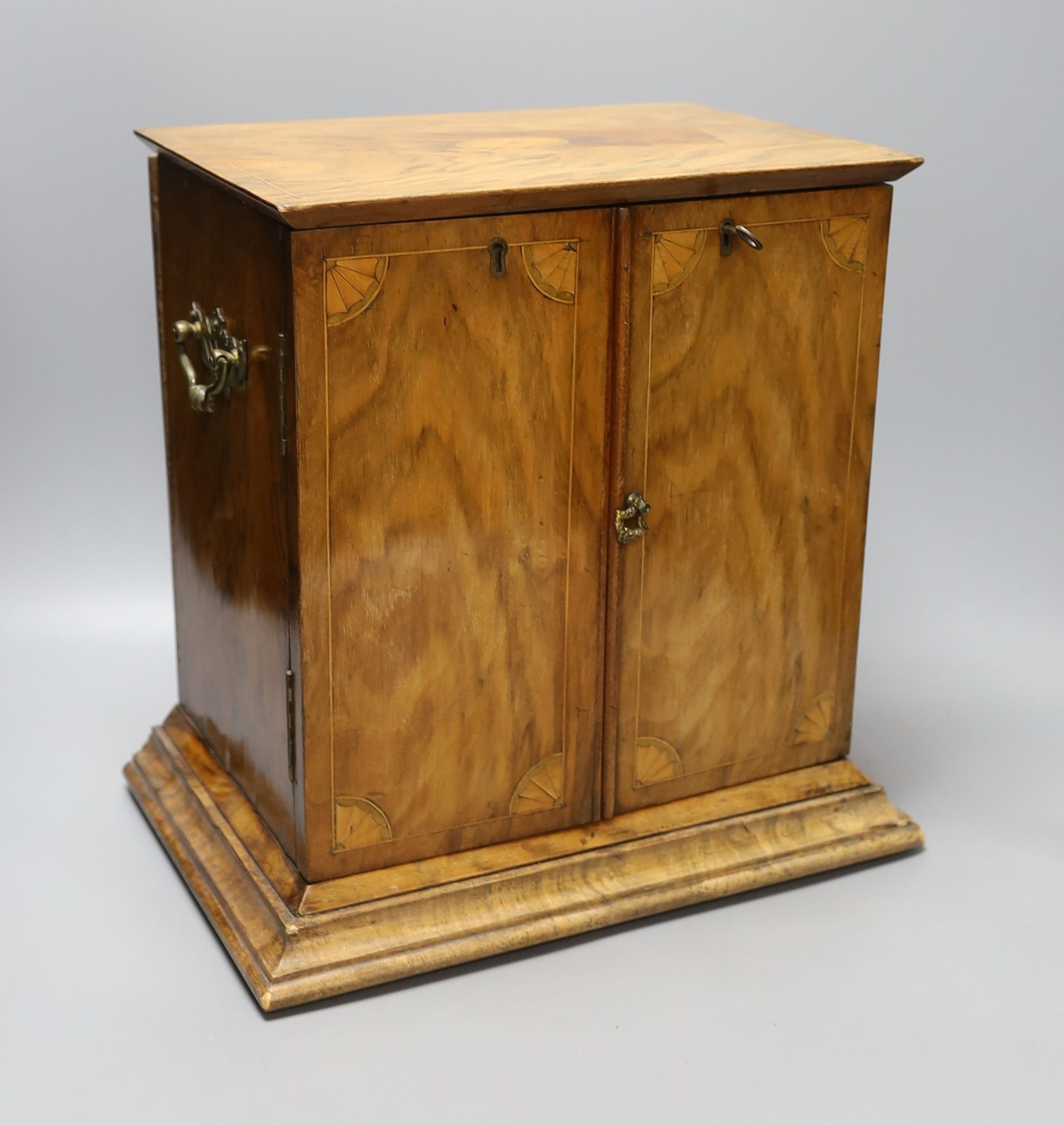 An Edwardian inlaid walnut table cabinet, 34cm wide